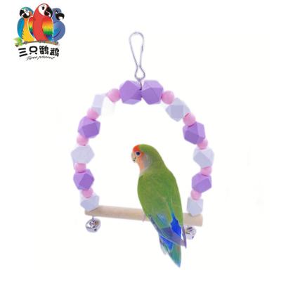 China Viable Small And Medium Parrot Swing Toy Color Bite And Train Cage Accessories Bird Perch Wood Cage Hanging Toys for sale