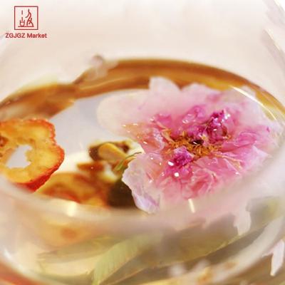 China Herbal Flavored Tea Rose Flower Blooming Tea Organic Orange Peel Flavored Tea Bag for sale