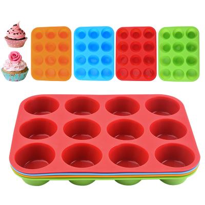 China 0727 Viable 12 Holes Round Chocolate Candy Mold Tart Pudding Tool Egg Silicone Cake Baking Mold for sale