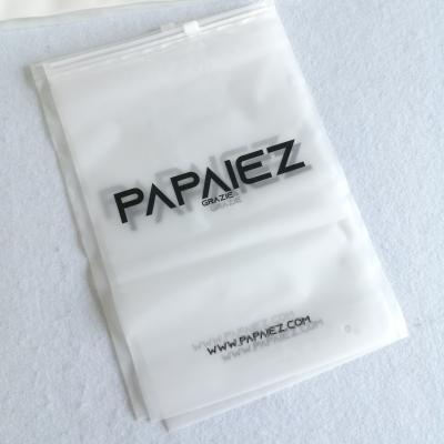 China Customized Recyclable Transparent Frosted Ziplock Socks Clothes Plastic Packaging Bag for sale