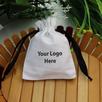 China Natural White Cotton Drawstring Jewelry Packaging Pouch Wedding Favor Bags With Custom Logo for sale