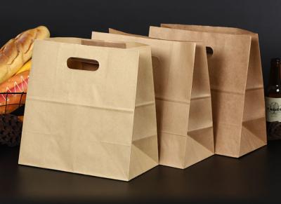 China Recicle las bolsas de papel de Perforatedbrown Kraft, bolsas de papel para llevar con la impresión del logotipo en venta