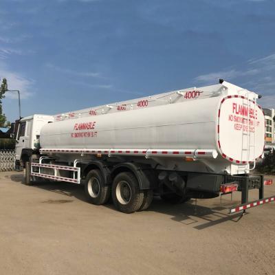 China Carbon steel Sinotruck 20000 25000 liter palm oil delivery fuel delivery tanker truck for sale for sale