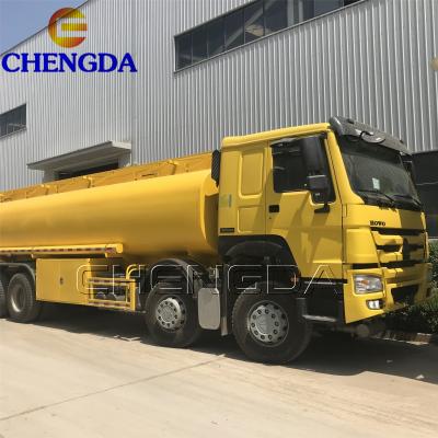 China Carbon Steel Sinotruck HOWO 25cbm 30cbm 8x4 Fuel Tanker Trucks For Transporting Oils for sale