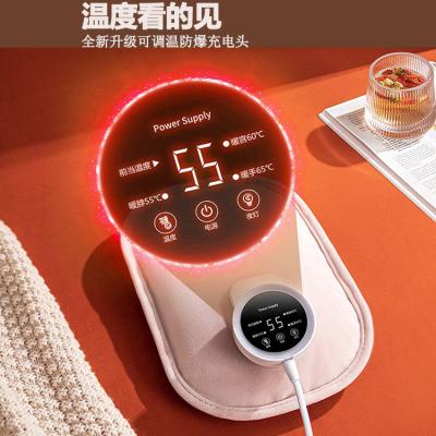 China Currency Digital explosion-proof clip, smart hot water bag, rechargeable hand warmer, belly warmer, waist warmer, hand warmer for sale