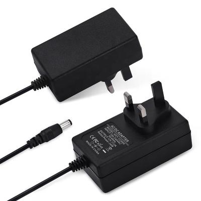 China 5v 3a Power Adapter With UK Eu Plug 100-220V AC To DC Transformers 5v Power Supply Changeover Adapter For LED Strip Light Camera HXY-053000 for sale