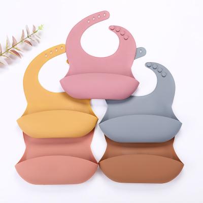 China Wholesale Custom Waterproof Silicone Baby Bib Silicone Food Grade Washable Baby Eating Bibs Baby Logo Printing for sale