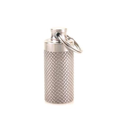 China Pill Key Chain Model Titanium Storage Capsule Camping Waterproof Titanium Outdoor Rack Box for sale