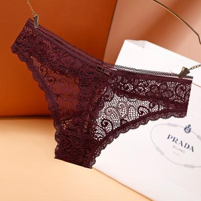 China New bottoms antibacterial charm female transparent hollow out temptation low waist without brand lady triangle underwear for sale