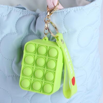 China Mini Eco-friendly Decompression Silicone Key Chain Toys Push Noise Bubble Wiggle Sensory Toy for sale