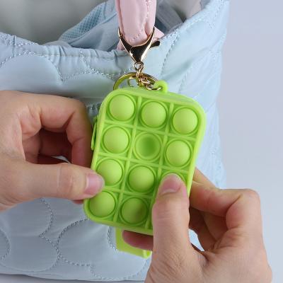 China Eco-friendly Decompression Key Chain Silicone Toys Push Pop Bubble Wiggle Sensory Toy for sale