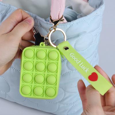 China Eco-friendly mini head decompression bag chain silicone toys push noise bubble wiggle sensory toy for sale