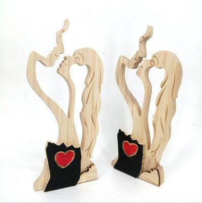 China Simple Wood Carving Wood Art Decor Lovers Lovers Kissing Crafts Decoration Room Decoration for sale