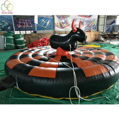 China Outdoor Interactive Bull Game Entertainment Inflatable Rope Pulling Sports Game For Kids for sale