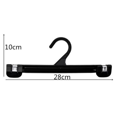 China 11 Inch BH280 Eco-friendly Materials Push Up Metal Springs And Down Black Plastic Pants Hanger for sale