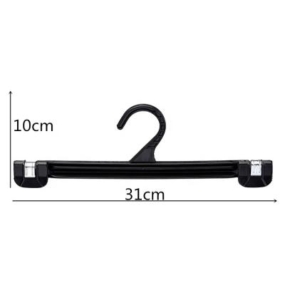 China 11 Inch BH310 Eco-friendly Materials Push Up Metal Springs And Down Black Plastic Pants Hanger for sale