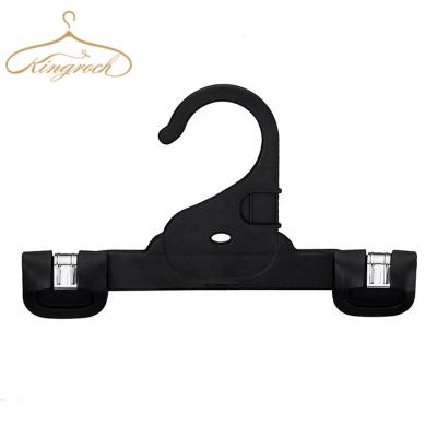 China BH60 21CM Eco-friendly Material Metal Rise And Cut Down Black Plastic Pants Hanger For Kids Child Baby for sale