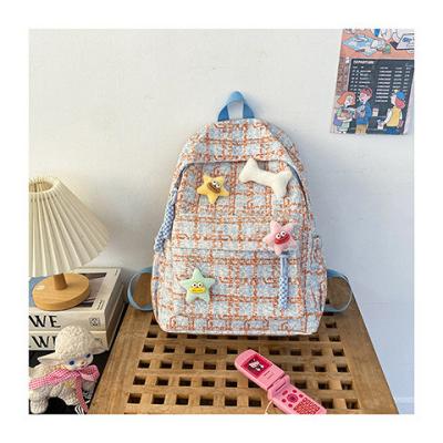 China High appearance level small fresh check bag junior high school backpack female college students fall and winter backpack for sale