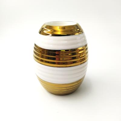 China Large Home Elegance Gold Luxury Candlestick Decoration Ceramic For Hotel And Restaurant for sale