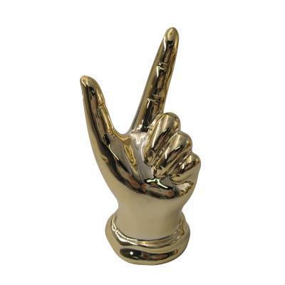 China Art Decor Than V Gesture Gold Ceramic Home Decor Luxury Modern for sale