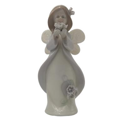 China Novelty Little Elf Holding A Flower Decor Room Home Ceramic Nordic Luxury For Office And Bedroom for sale