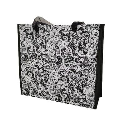 China 100% recycle black flower logo silkscreen printing nonwoven fabric bag for sale