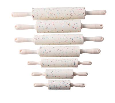 China Non-stick Silicone Tool Color Point White Flour Roll Stocked Flour Stick Baking Rolling Pin for sale