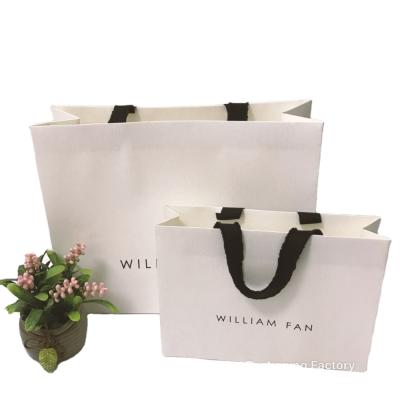 China Large Promotion Recyclable Wholesale Biodegradable Clothes Luxury Retail Paper Shopping Bag To Carry Retail Bags for sale