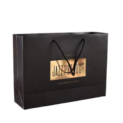 China Wholesale Recyclable Custom Printed Paper Bag With Logo Printing Black Luxury Gift Shopping Paper Bag With Handle for sale