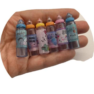 China Cartoon Toy 1:6 Scale Miniature Baby Bottles For Dollhouse Play Pretend Kitchen Food Toys For Children Mini Drink for sale