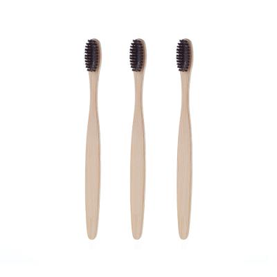 China Custom Made Bamboo Toothbrush Eco-Friendly 100% Natural Biodegradable Charcoal Toothbrush for sale