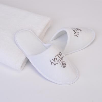 China Exquisite Disposable Hotel Amenities Eco-friendly Disposable Hotel Amenities White Cotton Spa Slippers With Logo for sale