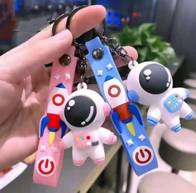 China Creative cute small gift pendant ornament silicone couples astronaut doll key chain backpack standard size for sale