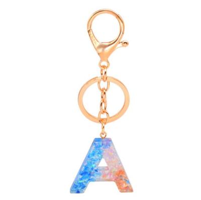 China Eco-Frendly Personality Creative Crystal Key Chain Ornaments Capital Letters Dried Petals Stick Key Chain for sale