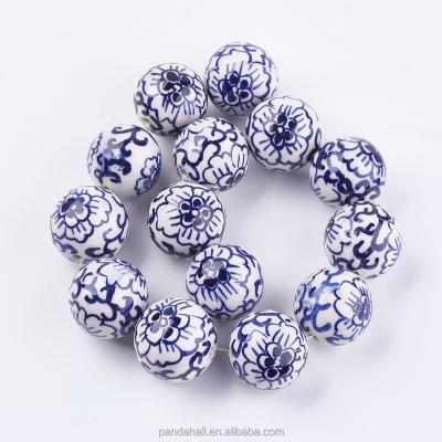 China Pandahall 28mm Ceramic Series With Medium Blue Flower And White Porcelain Handmade Beads for sale