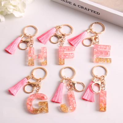 China Crystal Fashion Alphabet Initial Letter Tassel Butterfly Key Chain Pendant Keychain For Purse Handbags Women Girl for sale