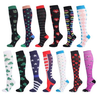 China 2022 new movement men's and women's sports elastic compression thongs stockings running high long tube gaiters pressure socks for sale