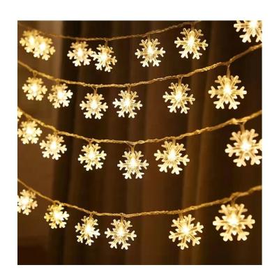 China Newest Design Commercial Christmas Global Use Snowflake String Lights LED String Lights Indoor and Outdoor Decorative Lights for sale