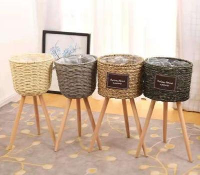 China Best Home Decor Popular Rattan Plant Stand, Planter Holder Wholesale Natural Seagrass Vase Handicraft Wicker Flower Pot for sale