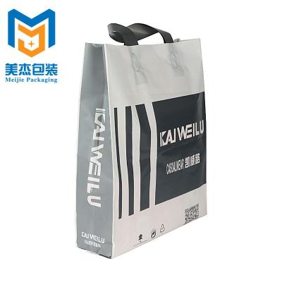 China Eco - Friendly Shock Resistance Custom Printed Soft Loop Packaging Plastic Bag For Shopping Handle for sale