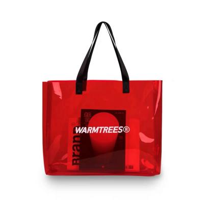 China Recyclable Wholesale Custom Waterproof Clear Logo Fashion Transparent PVC Tote Bag With Handles for sale