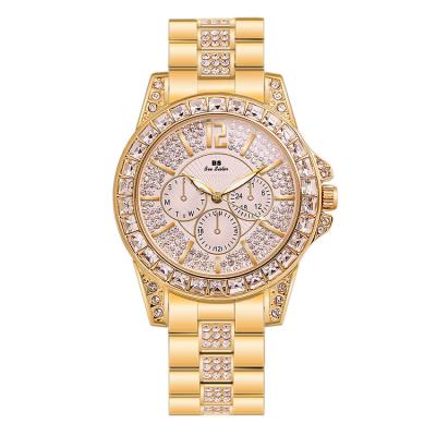 China 2021 New Day/Date Gold Quartz Watches Stylish Elegant Ladies Watch Modern Crystal Diamond Wristwatches for sale