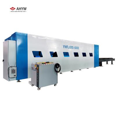 China Laser CUTTING Full Closed Sheet And Tube Fiber Laser Cutting Machine With Exchange Table for sale