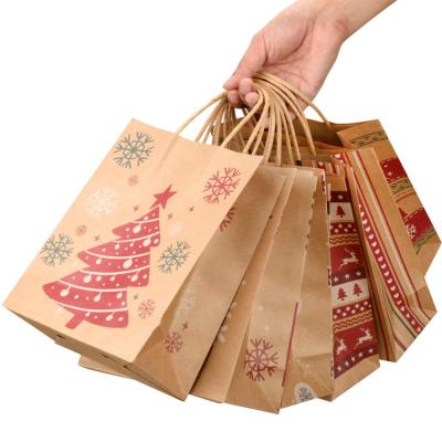 China Logo Printing Packaging Bags Cheap Retail Christmas Brown Paper Disposable Custom Shopping Packaging Bags With Handles for sale