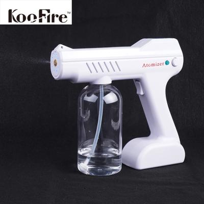 China Sanitizer Spray Gun KOOFIRE Blu Ray Sprayer Portable Wireless Disinfection Refillable Blue Light Atomizer Vapor Nano Spray Gun for sale