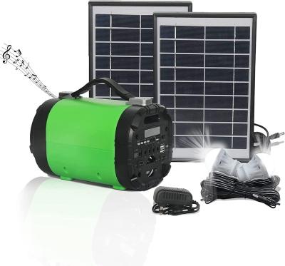 China Portable Solar Panels Kit With 2Pcs 10w Wireless Solar Generator LED Light Flashlight Speaker Power Station for sale