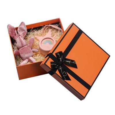 China Luxury Orange Birthday Gift Box Lipstick Package Box With Hand Packaging Gift Boxes for sale