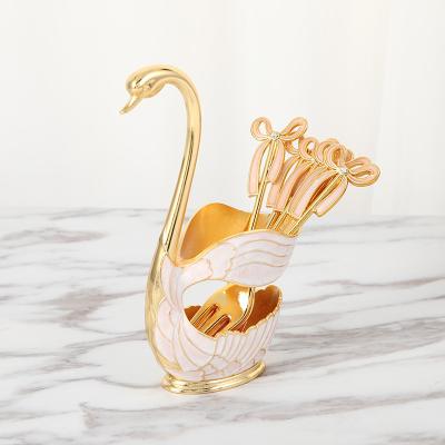 China Creative cute swan style metal swan spoon rack viable European home shelf storage for sale