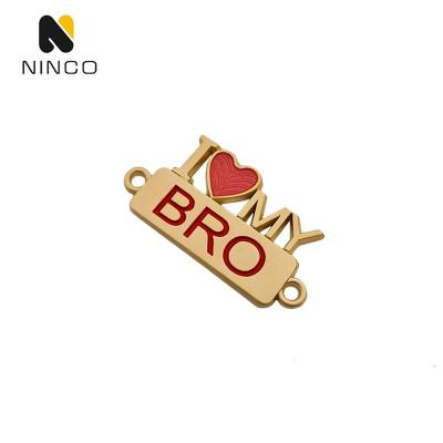 China Viable small tag maker metal sign and custom clothing brand engraved metal tags labels with holes for clothing bag accessories for sale