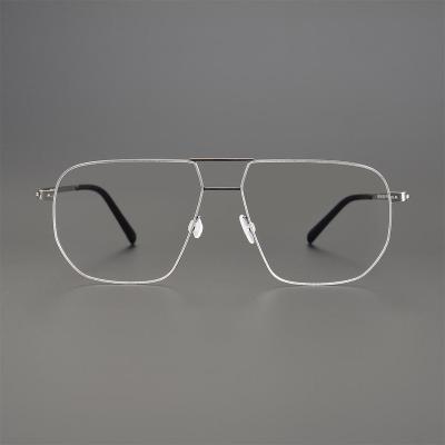 China Custom Presbyopia Glasses New Simple And Elegant Berlin Glass Anti-Blue Light Metal Screwless Optical Glasses for sale